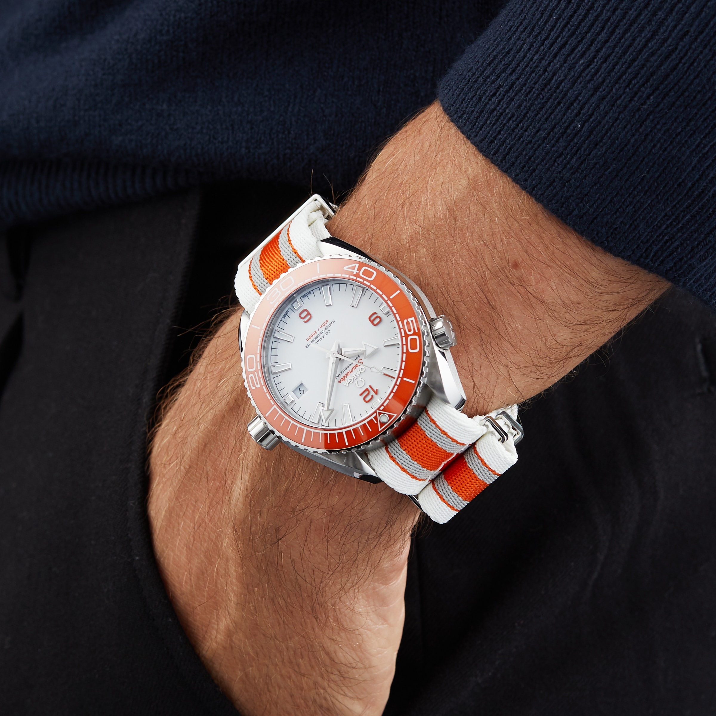 Omega planet clearance ocean orange strap