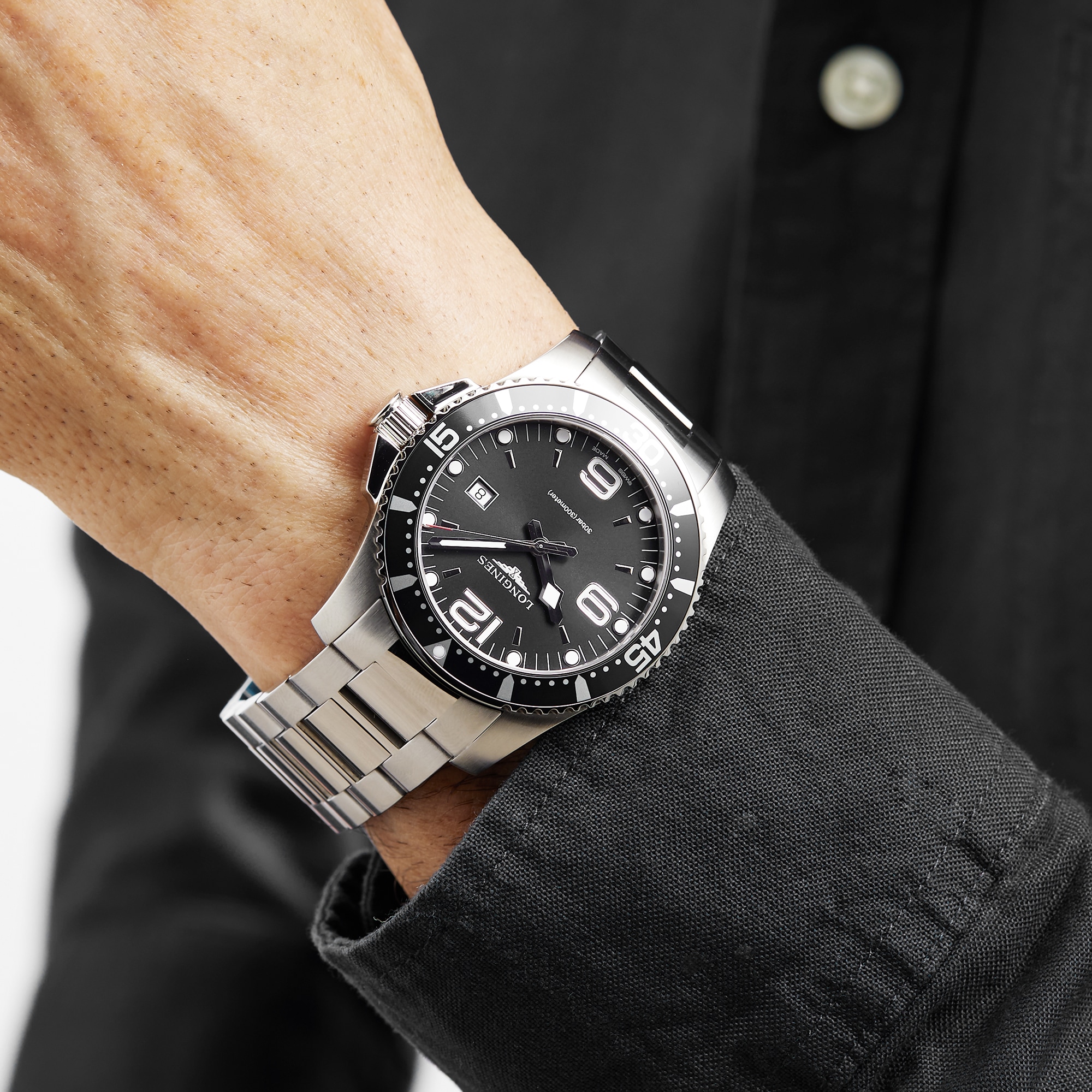 Tag heuer aquaracer calibre best sale 5 vs longines hydroconquest