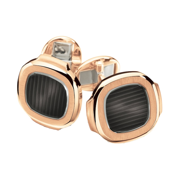 Patek Philippe Nautilus Cuff Links. Sapphire crystal and black-brown center. 18 K rose gold.