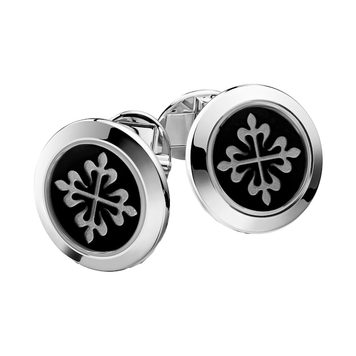 Patek Philippe Calatrava cuff links. Engraved onyx center. 18 K white gold.