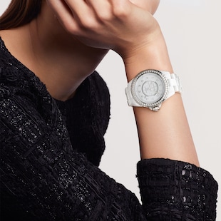 CHANEL J12 DIAMOND BEZEL WATCH CALIBRE 12.1, 38 MM