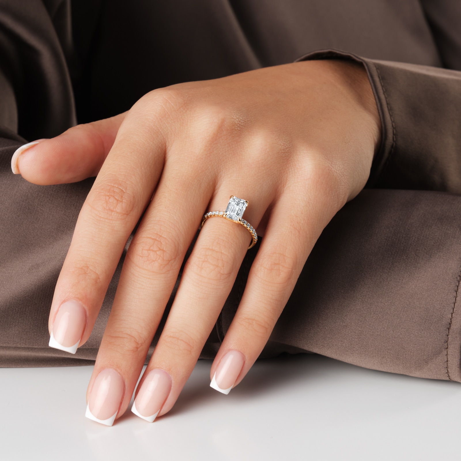 Goldsmiths 18ct Yellow Gold 2.20cttw Emerald Cut Lab Grown Diamond Set Shoulder Solitaire Engagement Ring Goldsmiths 18ct Yellow Gold 2.20cttw Emerald Cut Lab Grown Diamond Set Shoulder Solitaire Engagement Ring