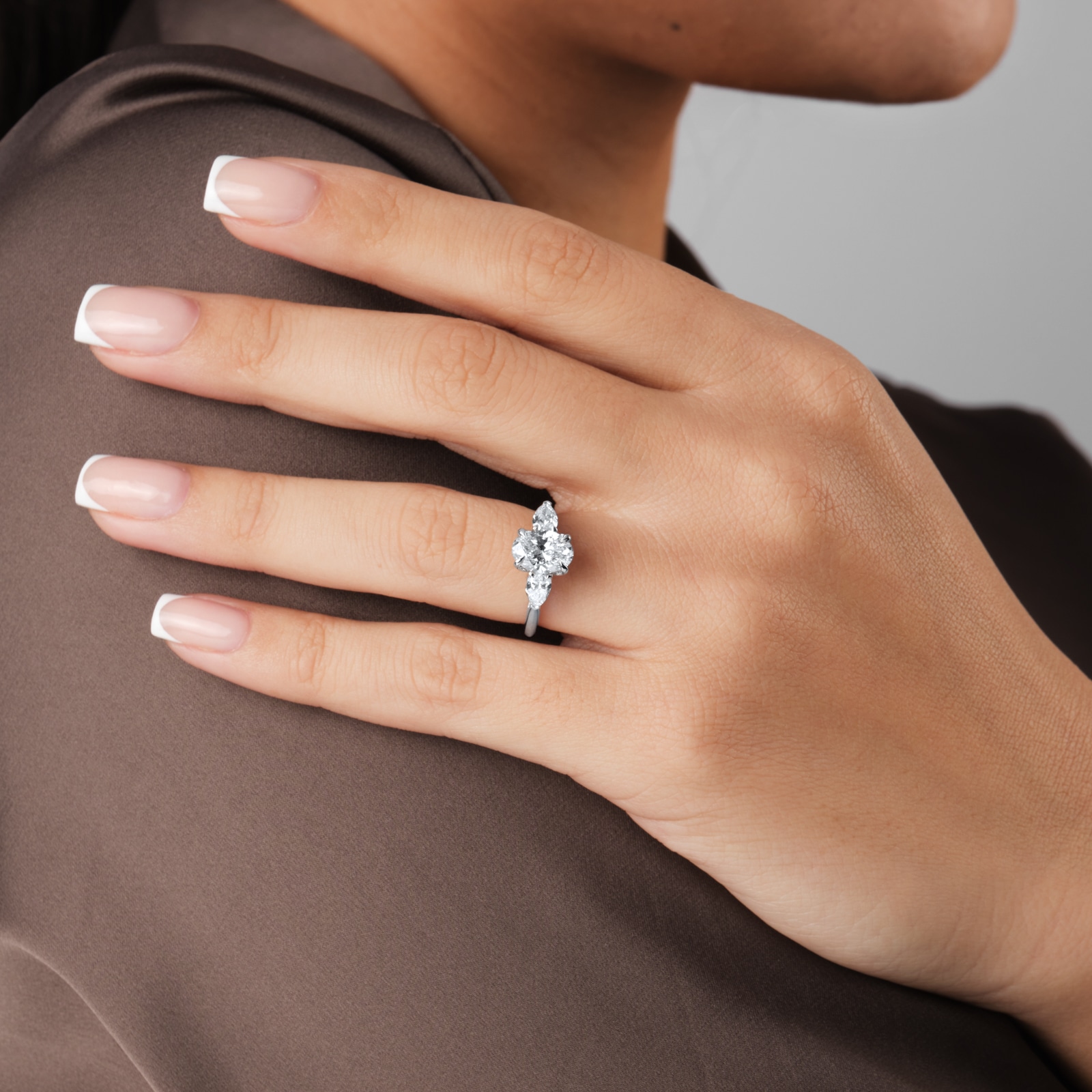 Goldsmiths Platinum 2.00cttw Oval and Pear Cut Lab Grown Diamond  3 Stone Engagement Ring