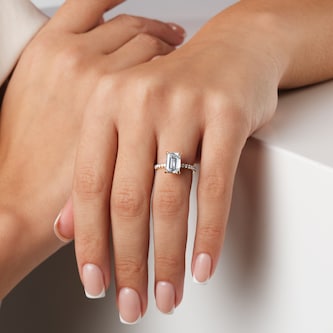 Goldsmiths 18ct Yellow Gold 2.70cttw Emerald Cut Lab Grown Diamond Set Shoulder Solitaire Engagement Ring Goldsmiths 18ct Yellow Gold 2.70cttw Emerald Cut Lab Grown Diamond Set Shoulder Solitaire Engagement Ring