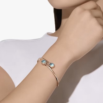Pomellato 18ct Rose Gold Nudo Sky Blue Topaz 
0.02ct Diamond Bangle