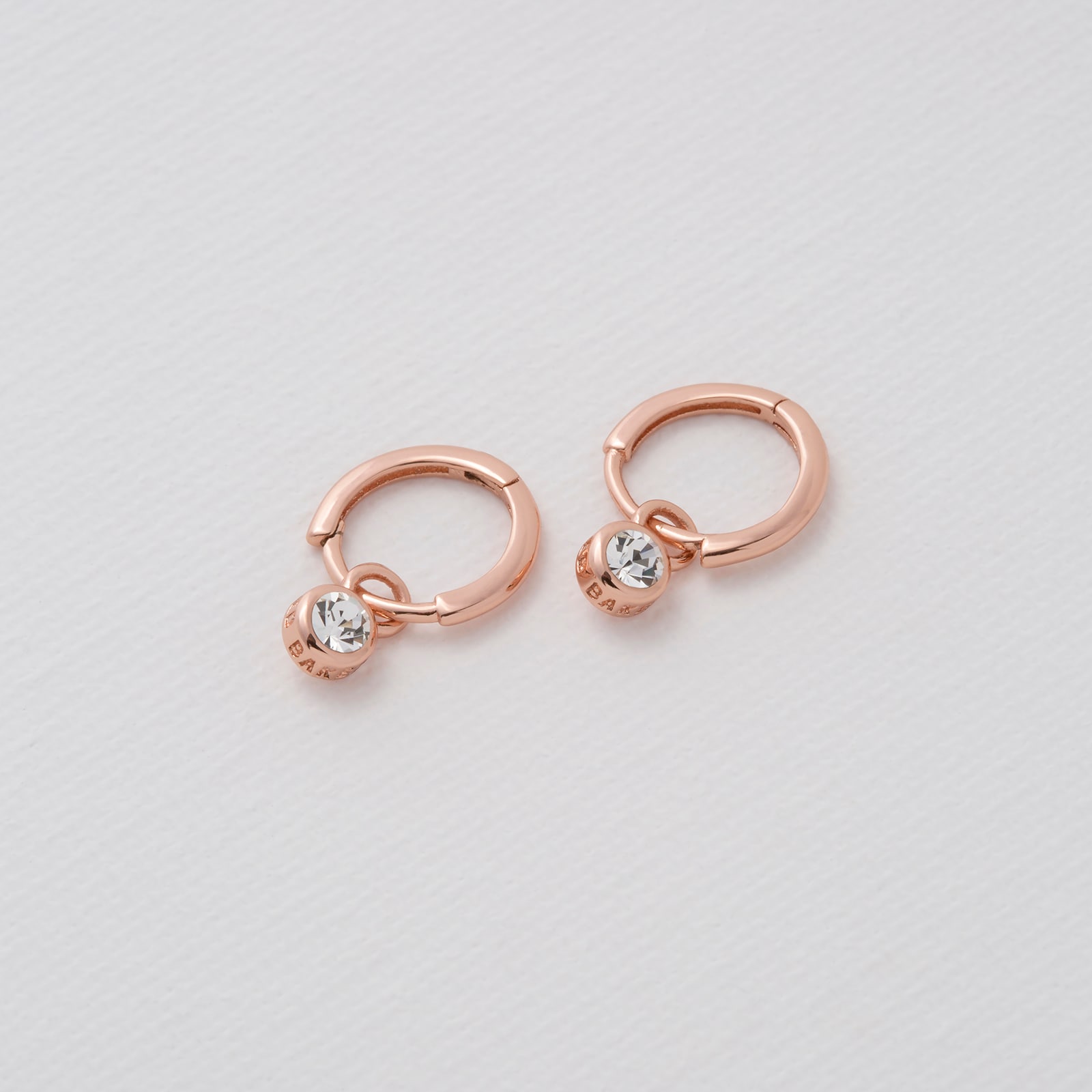 Ted Baker SINALAA Rose Gold Coloured Crystal Huggie Earrings Ted Baker SINALAA Rose Gold Coloured Crystal Huggie Earrings