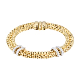 37250064 - 18 Yellow and White Gold Maori Two Row 0.18ct Diamond Bracelet