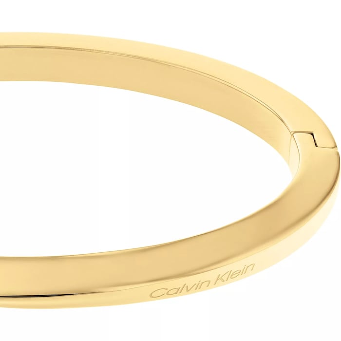 Calvin Klein Ladies Yellow Gold Coloured Twisted Hinged Bangle