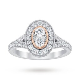 37410185 - Platinum 0.60cttw Diamond Oval Ring With Rose Gold Milgrain