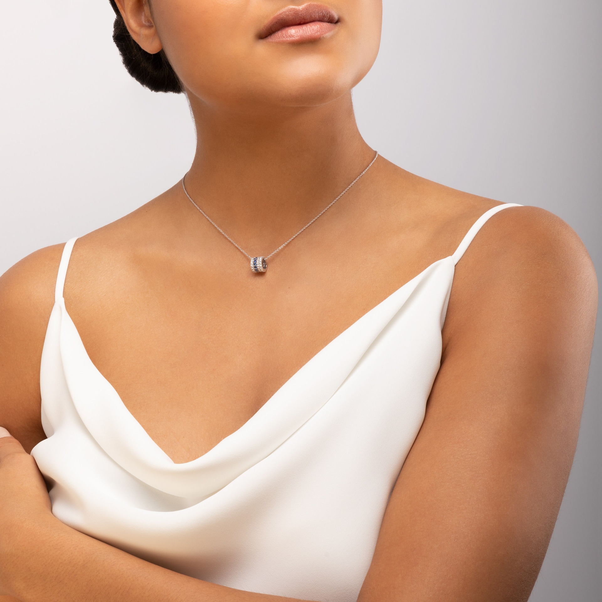 Bijoux Birks 18k White Gold 0.70cttw Diamond and 0.42cttw Sapphire Splash Roll Pendant Bijoux Birks 18k White Gold 0.70cttw Diamond and 0.42cttw Sapphire Splash Roll Pendant