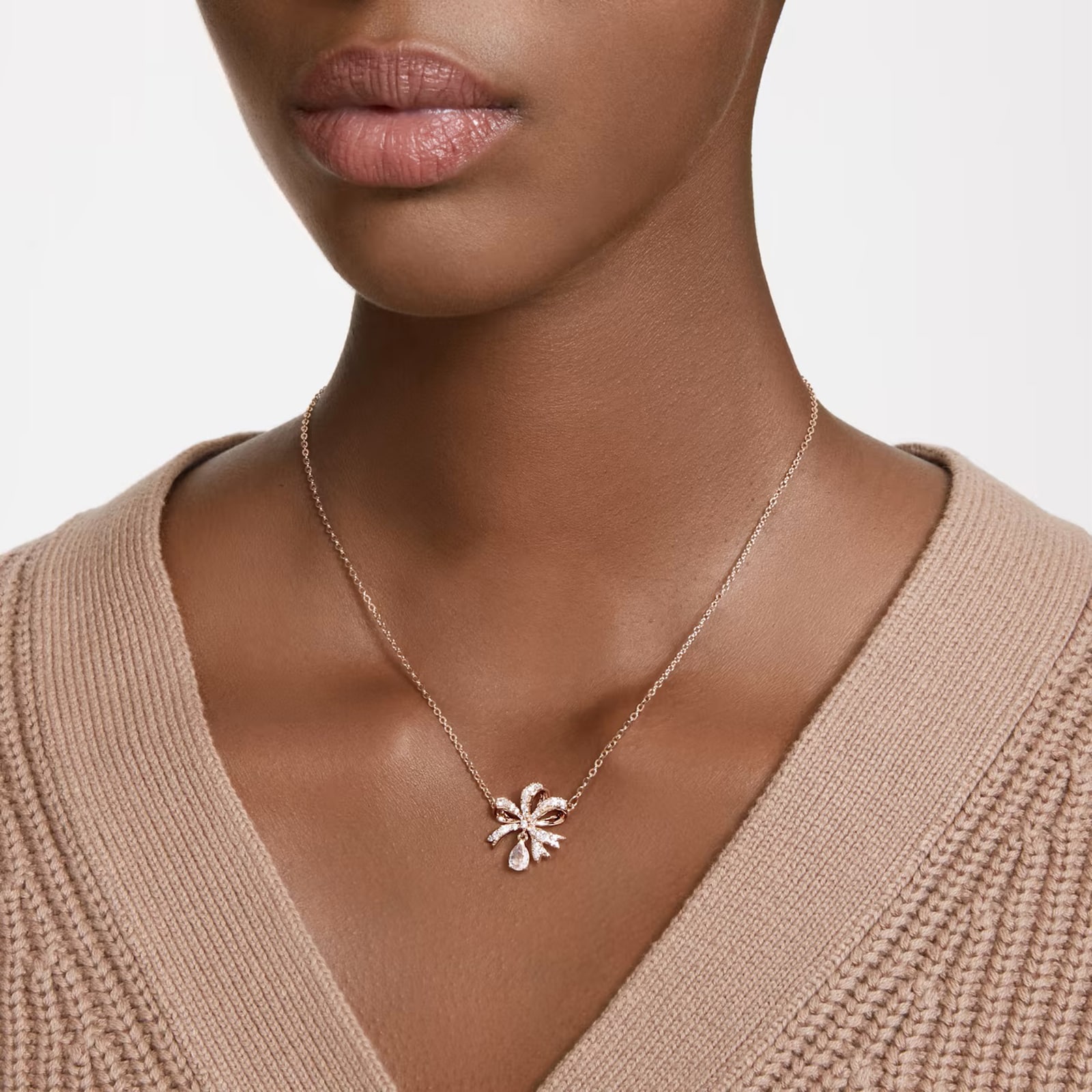 SWAROVSKI Volta Rose Gold Coloured Cubic Zirconia Bow Pendant