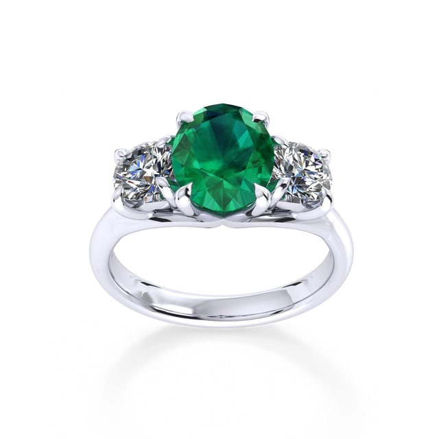 Ena Harkness Platinum And Three Stone 9x7mm Emerald Ring - Ring Size K