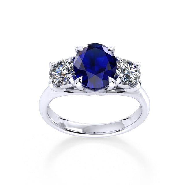 Ena Harkness Platinum And Three Stone 9x7mm Sapphire Ring - Ring Size J