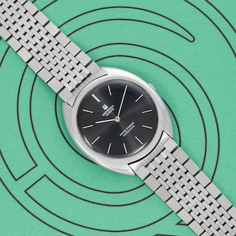 Pre-Owned Universal Geneve White Shadow